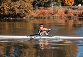 Evan Yang rows in competition