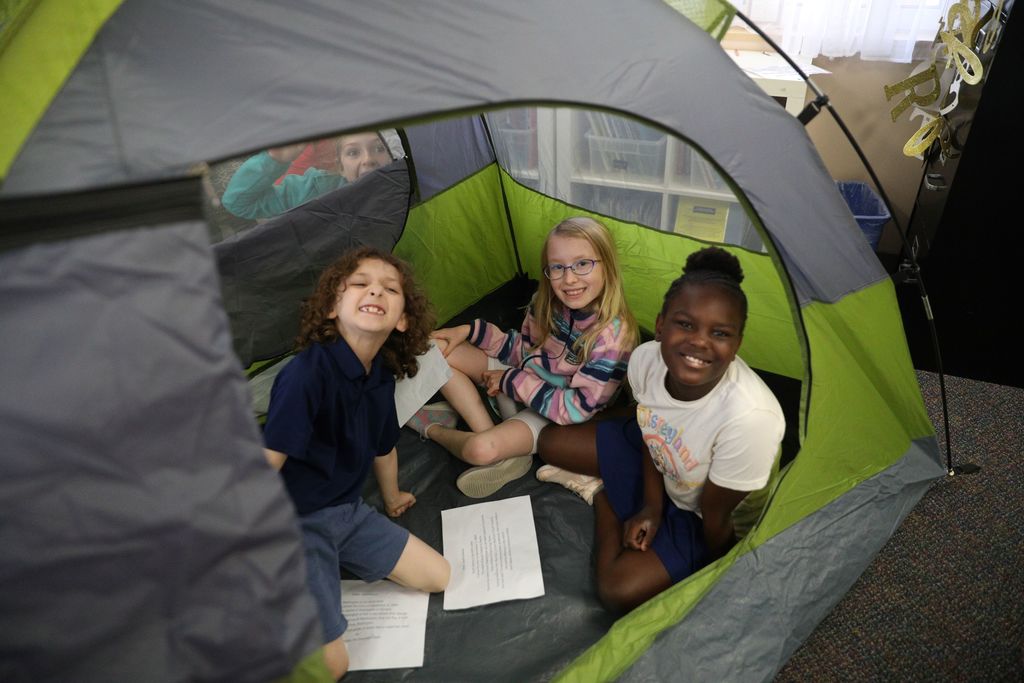 Kids Reading in Tent